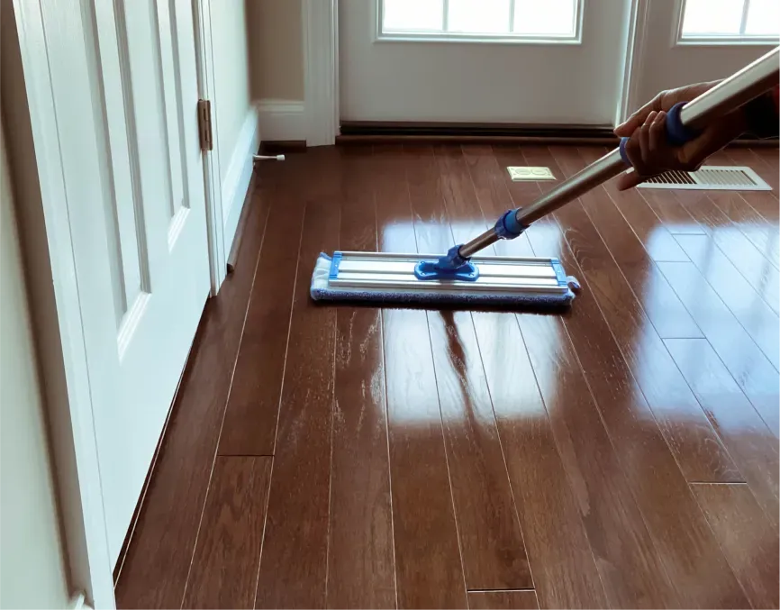 Wooden Floor Being Cleaned